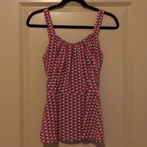 Strappy patterned peplum top